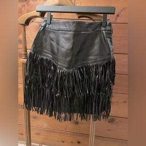 Black vegan leather fringe mini skirt